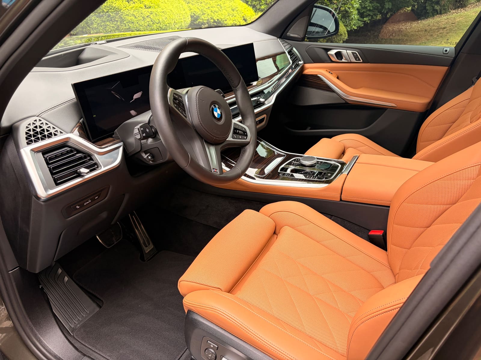 Tan leather car interior after a full interior detail